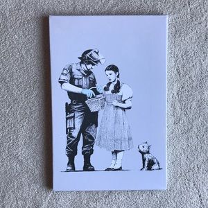 Banksy “Dorothy Police Search” canvas art piece